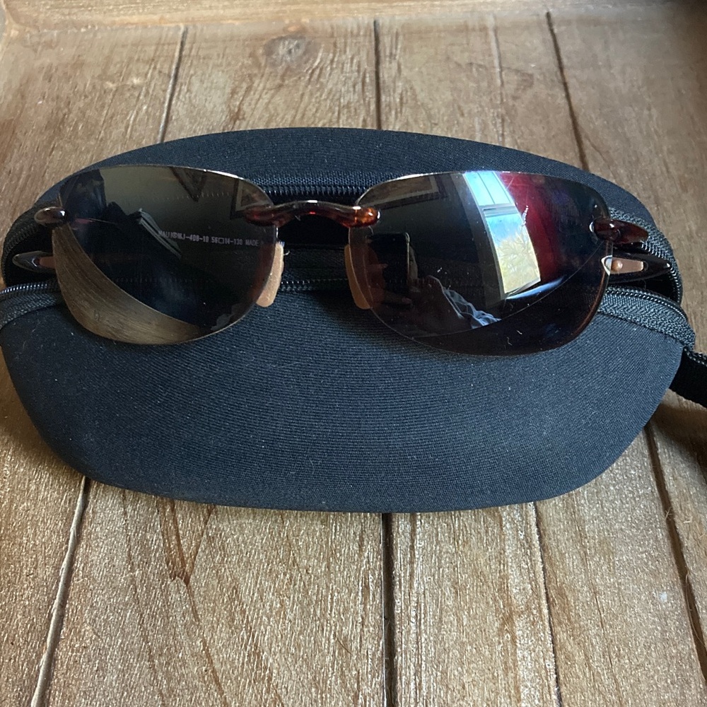 Maui Jim Rimless Sunglasses with Black Lenses and Brown Frames